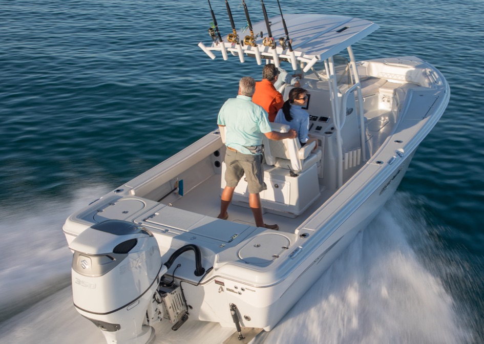 white boat acnhored with a suzuki df350a - dual ideal for fishing and other water activities